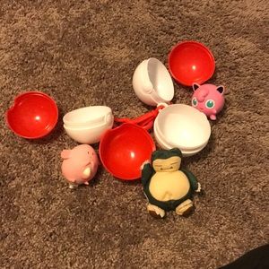 3 Pokémon toys with poke balls